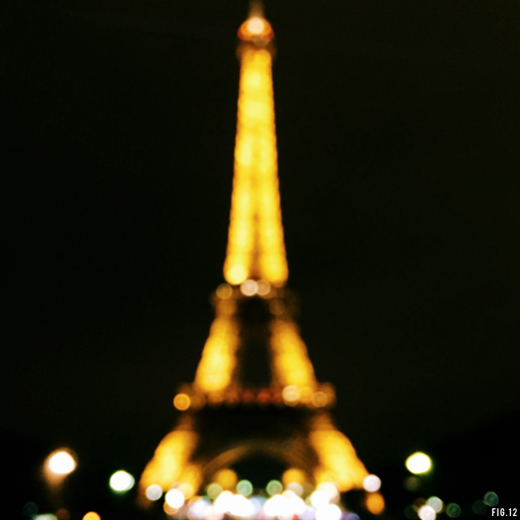 eiffel-tower-at-night-bokeh-blurred-lights