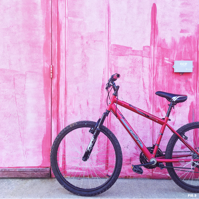 bike-against-a-pink-wall