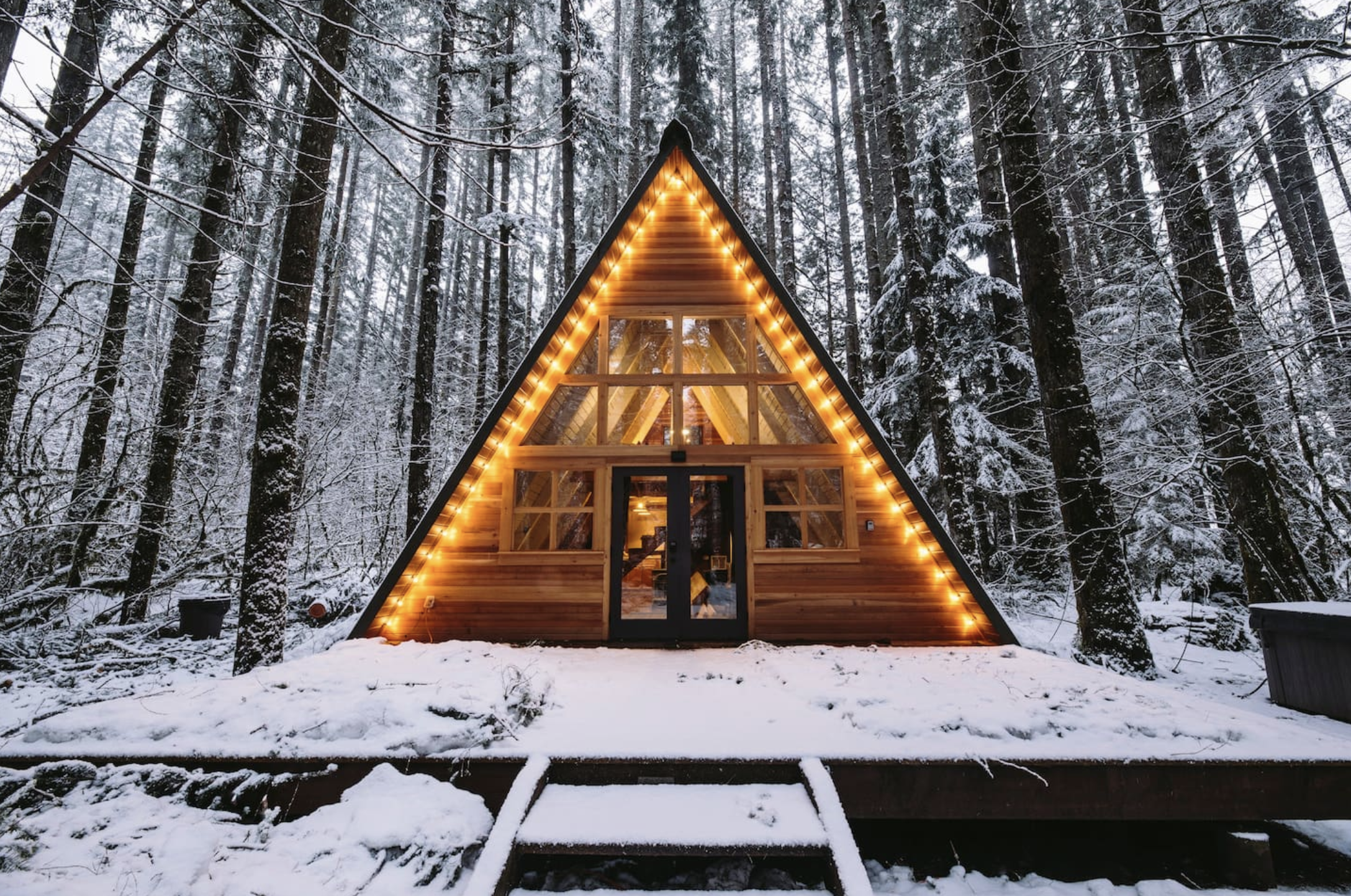 A Frame Cabin in the snow