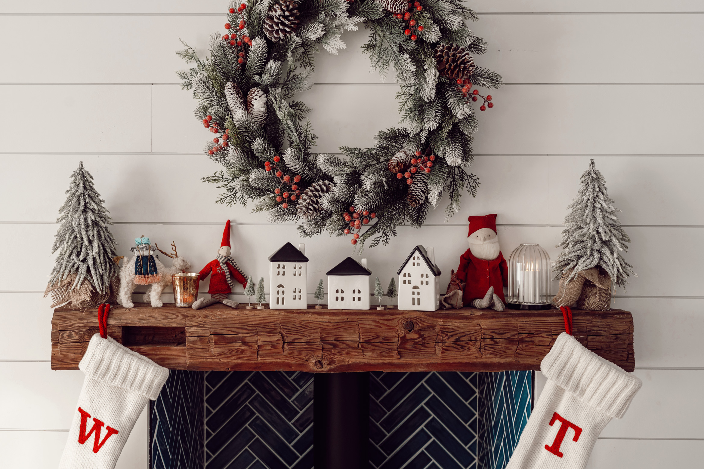 Fireplace mantel dressed for the holidays